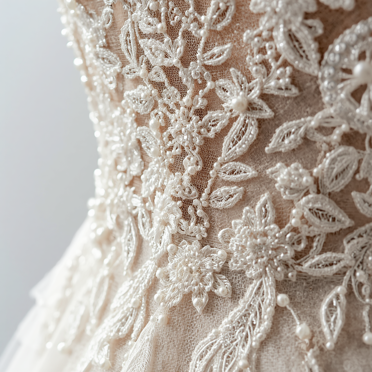 close up detail shot of elegant wedding dress, lace embroidery details, bodice detail, intricate beadwork, white background, professional bridal photography (1) close up detail shot of elegant wedding dress, lace embroidery details, bodice detail, intricate beadwork, white background, professional bridal photography (1)
